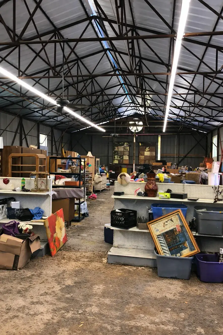 Ocala property cleanout before, a building packed floor to ceiling with furniture and junk