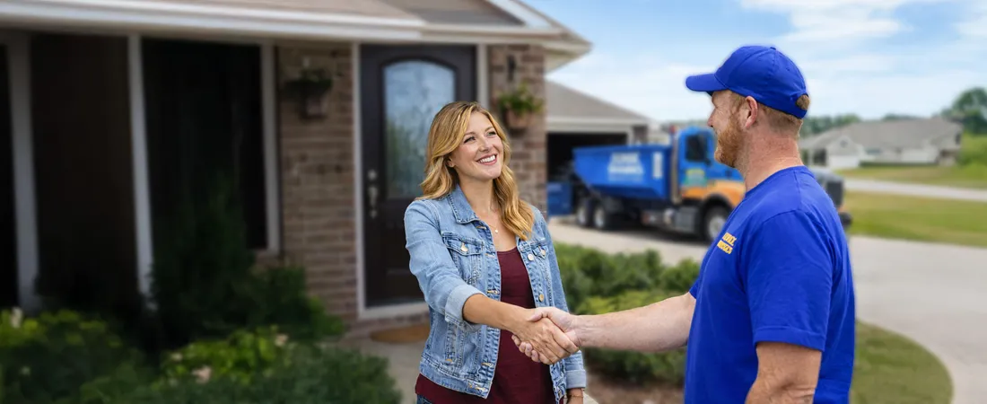Illustration, a Junk Sharks crew member greeting a homeowner